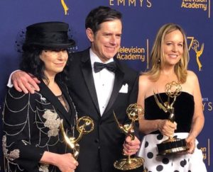 Amy Sherman-Palladino, Dan Palladino, and Robin Urdang with their 2018 Emmy Award for Outstanding Music Supervision for The Marvelous Mr. Maisel.